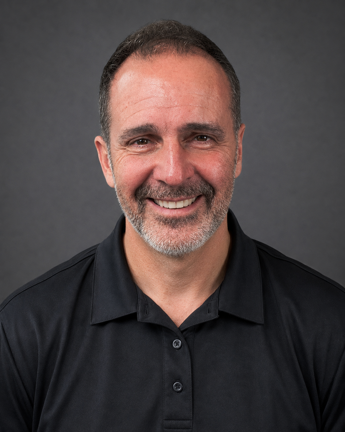 Front-facing portrait of Carlos Feliciano, Founder and CEO of Studio AI Desk